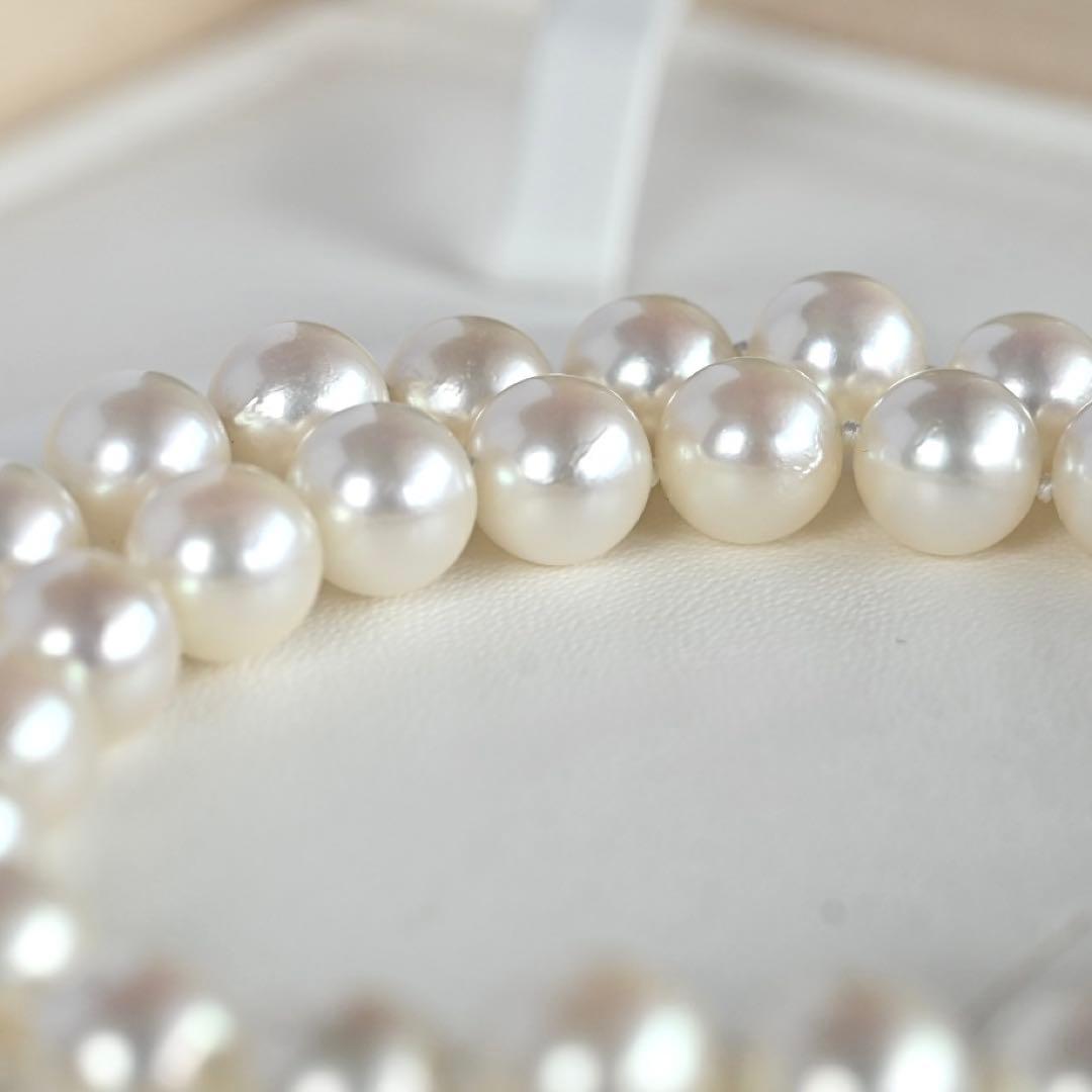 Takasaki K14 Akoya pearl necklace featuring 8mm pearls and sapphire flower pendant