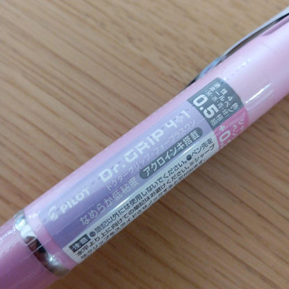 Pilot Dr. Grip 4+1 multi-function pen in pearl pink with 4-color ballpoint tips and 0.3mm mechanical pencil