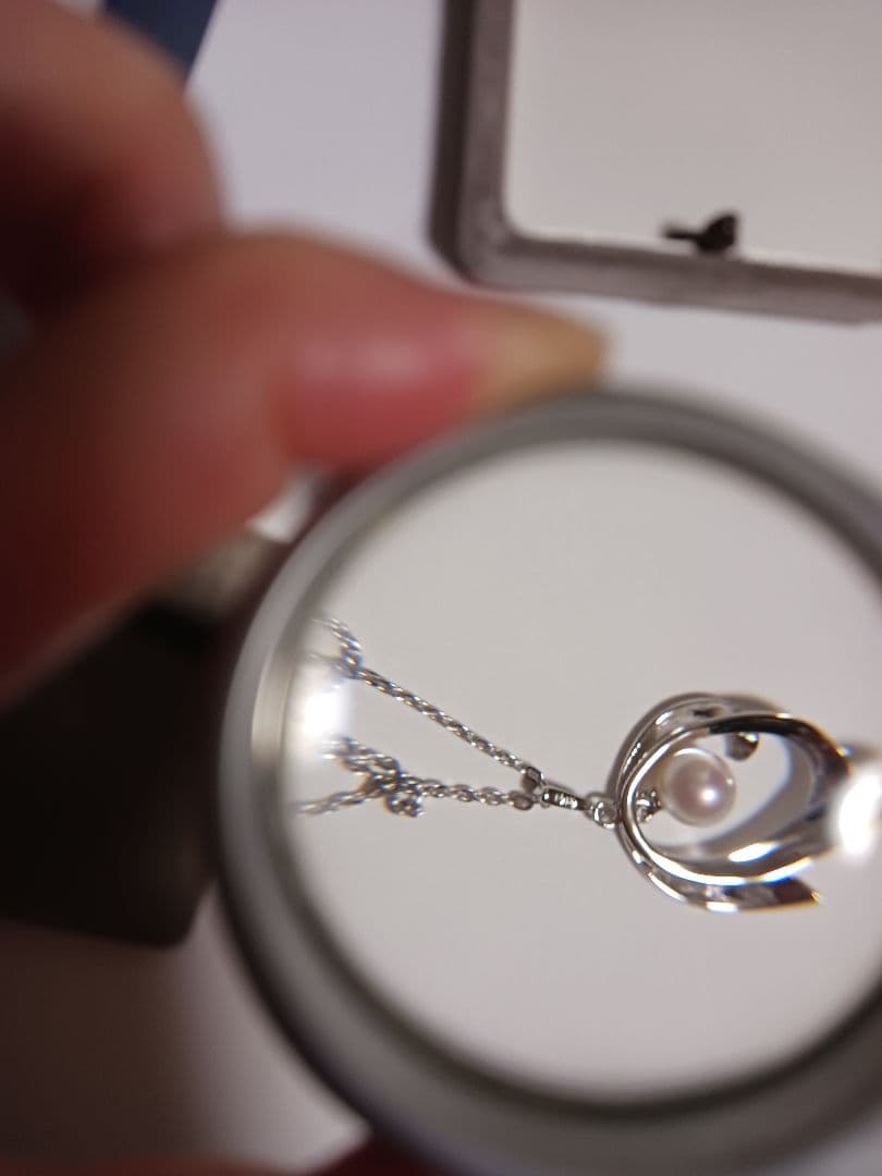Mikimoto pearl necklace featuring 5mm pearls with 40cm chain and 2.5cm pendant