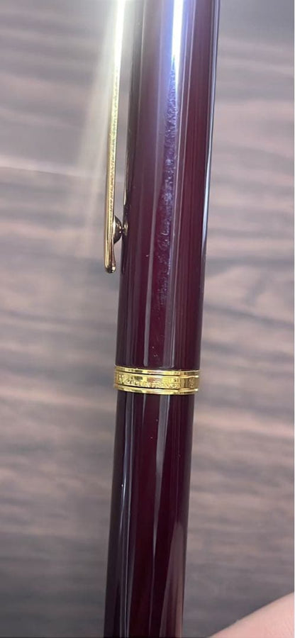Waterman Fountain Pen with K18 gold nib in wine red resin featuring a metal clip and simple straight body design