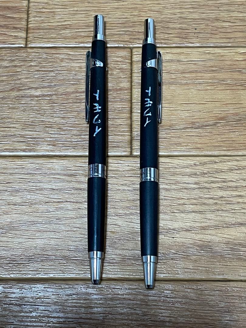 Two used Pilot Hi-Meka Holder Initial Model pieces showing some scratches and stains