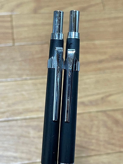Two used Pilot Hi-Meka Holder Initial Model pieces showing some scratches and stains