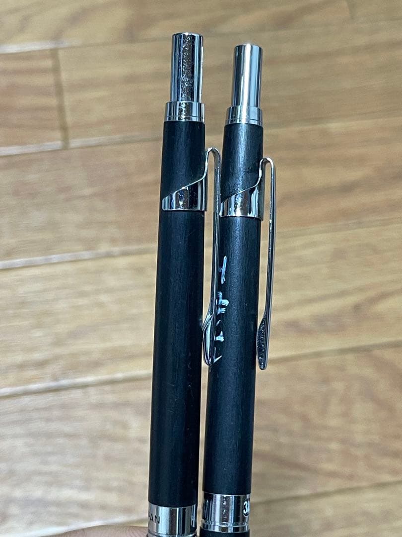 Two used Pilot Hi-Meka Holder Initial Model pieces showing some scratches and stains