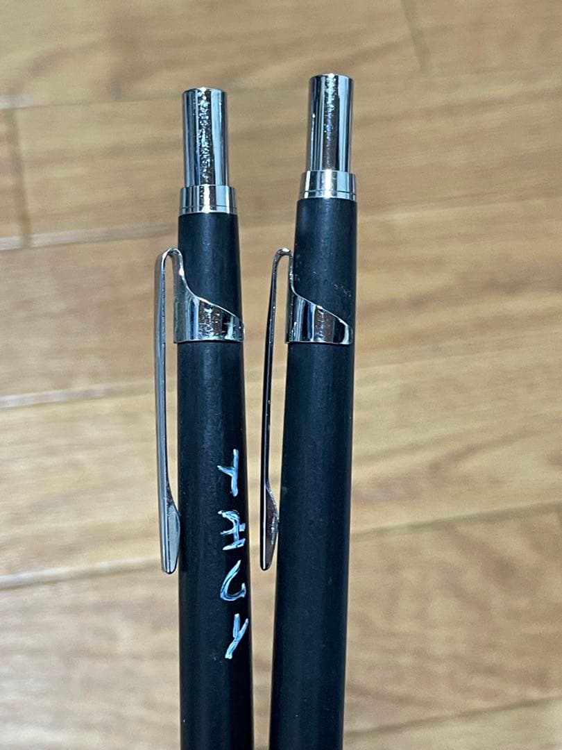 Two used Pilot Hi-Meka Holder Initial Model pieces showing some scratches and stains