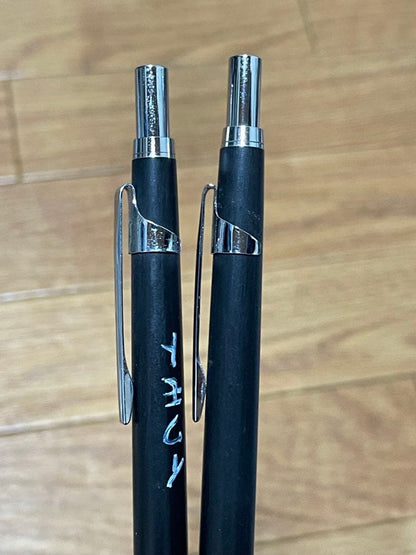 Two used Pilot Hi-Meka Holder Initial Model pieces showing some scratches and stains