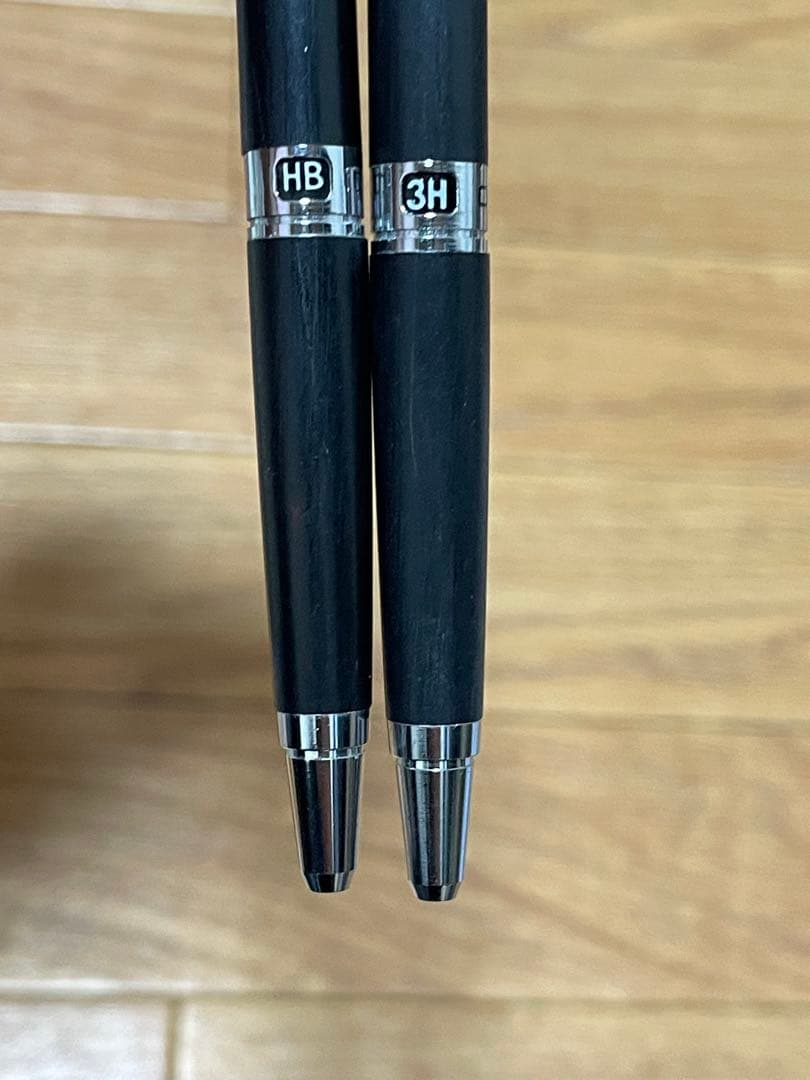 Two used Pilot Hi-Meka Holder Initial Model pieces showing some scratches and stains