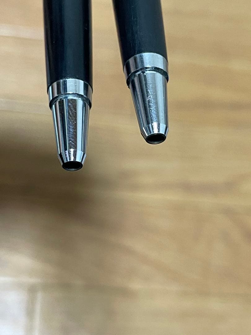 Two used Pilot Hi-Meka Holder Initial Model pieces showing some scratches and stains