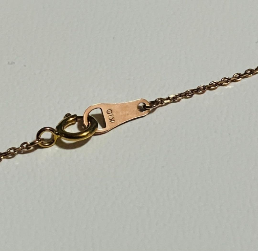 aga K10 PG Diamond Cross Necklace featuring a delicate diamond-studded cross pendant on a 40 cm chain