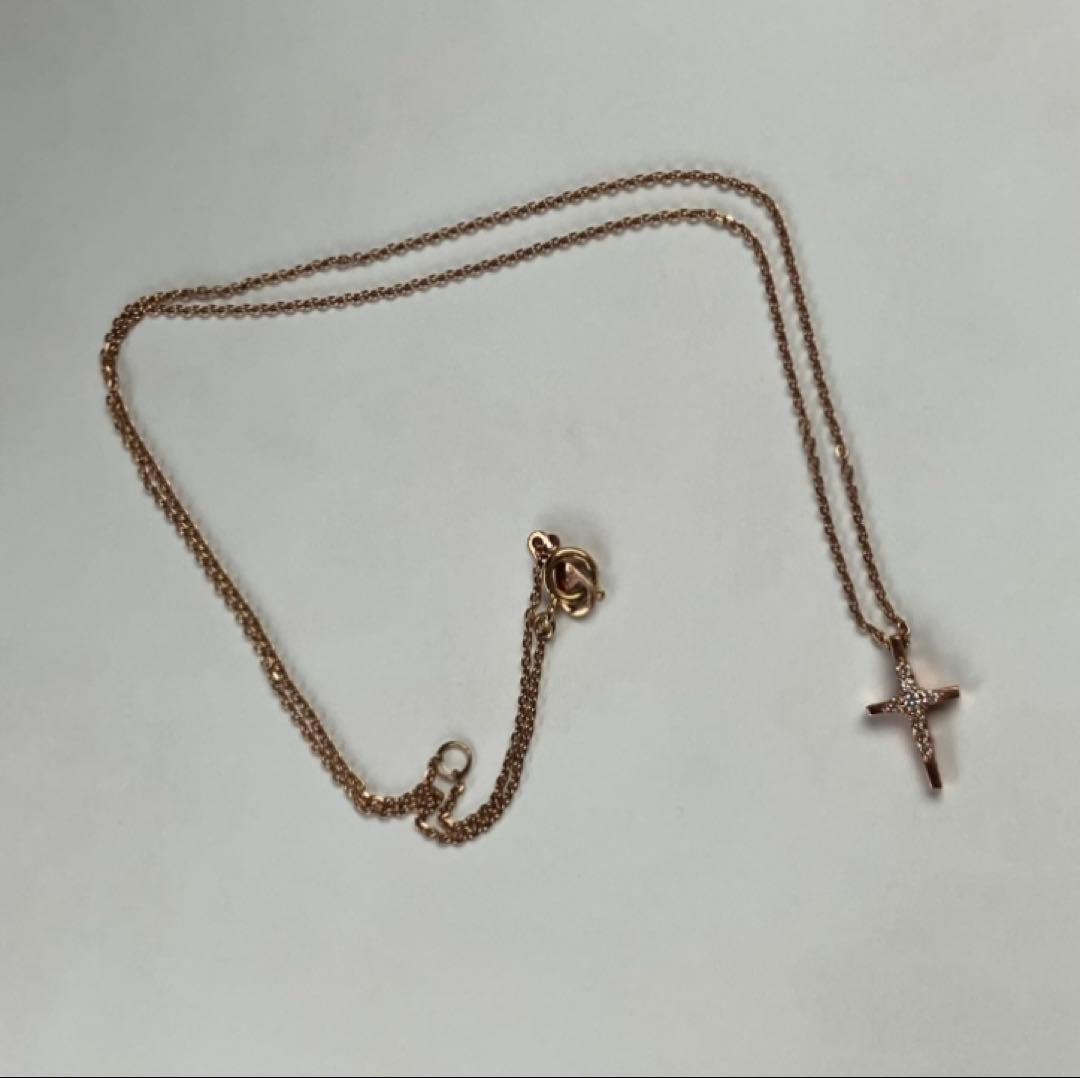 aga K10 PG Diamond Cross Necklace featuring a delicate diamond-studded cross pendant on a 40 cm chain