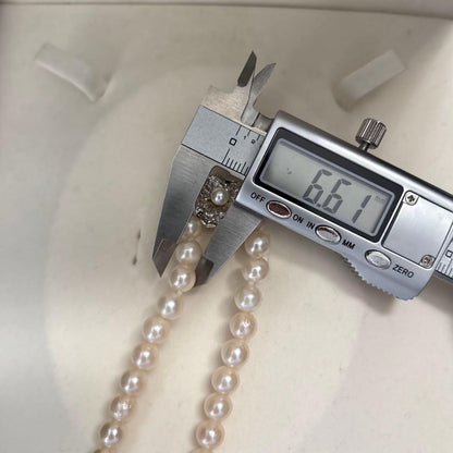 Aoya white pearl necklace with 6.5-7.0mm pearls measuring 43cm length and weighing 30g