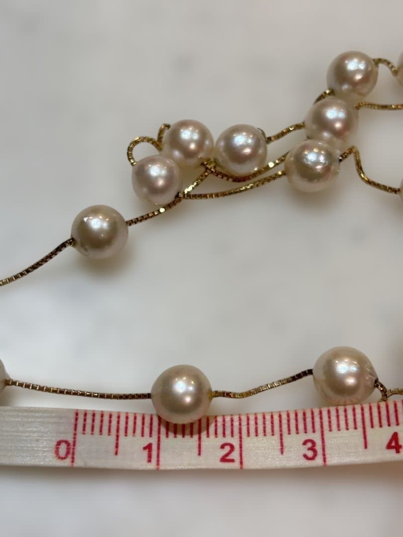 K18 Akoya pearl necklace featuring 30 round pearls sized 7.00 to 7.50mm on a 70cm gold chain