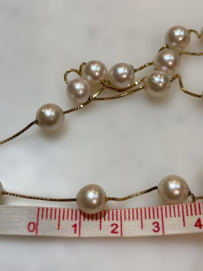 K18 Akoya pearl necklace featuring 30 round pearls sized 7.00 to 7.50mm on a 70cm gold chain