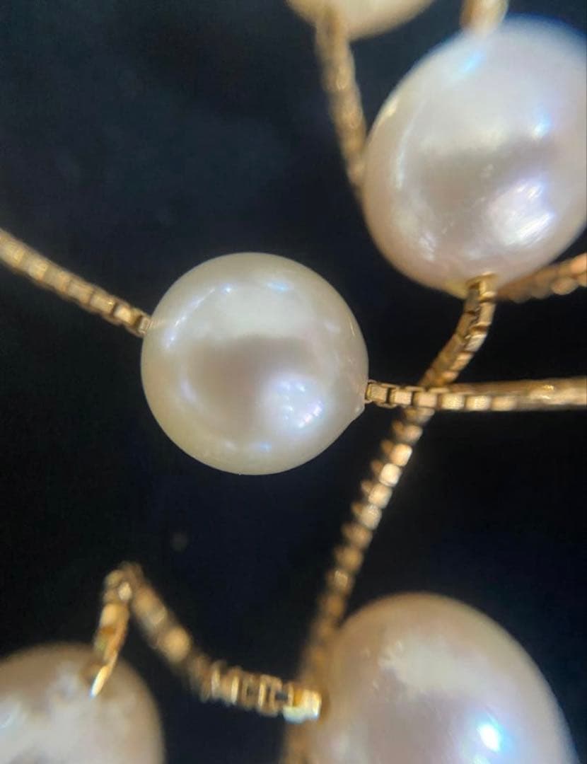 K18 Akoya pearl necklace featuring 30 round pearls sized 7.00 to 7.50mm on a 70cm gold chain