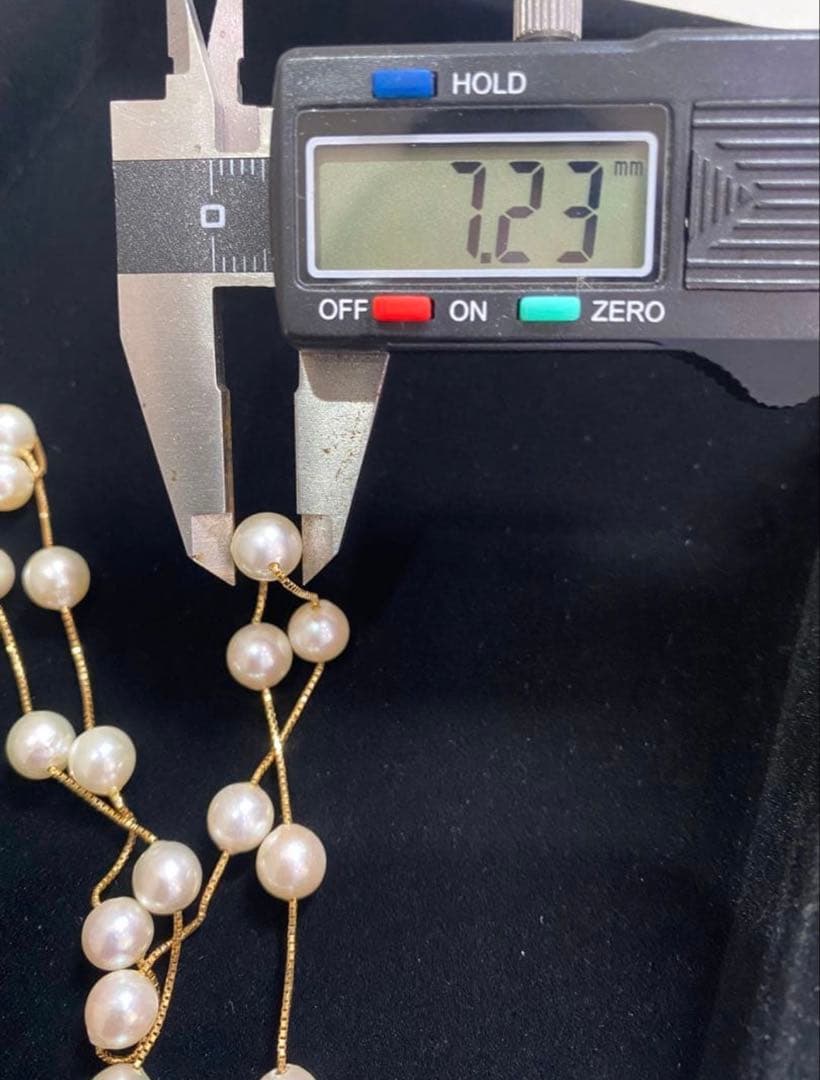 K18 Akoya pearl necklace featuring 30 round pearls sized 7.00 to 7.50mm on a 70cm gold chain