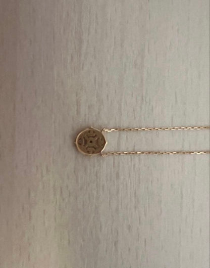 agete K10 gold necklace featuring a 0.01ct diamond pendant on delicate chain