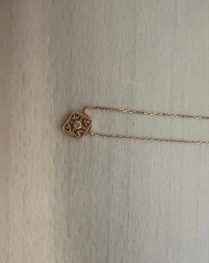 agete K10 gold necklace featuring a 0.01ct diamond pendant on delicate chain