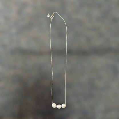 agete K10 necklace featuring a freshwater pearl with adjustable chain length and silver markings