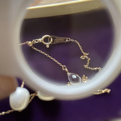agete K10 necklace featuring a freshwater pearl with adjustable chain length and silver markings