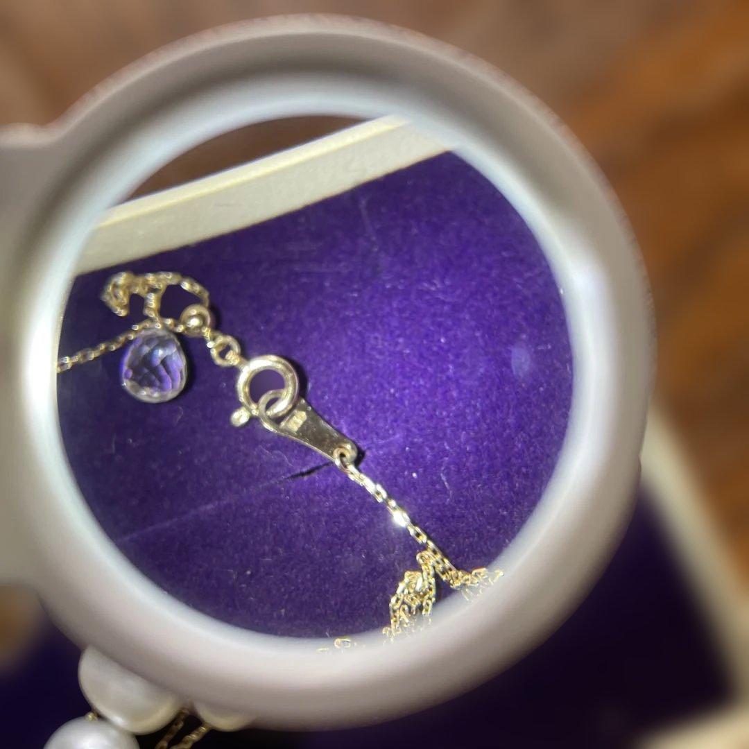 agete K10 necklace featuring a freshwater pearl with adjustable chain length and silver markings