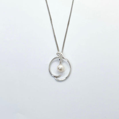 MIKIMOTO Akoya pearl necklace pendant top featuring 6.4mm white pearl set in silver