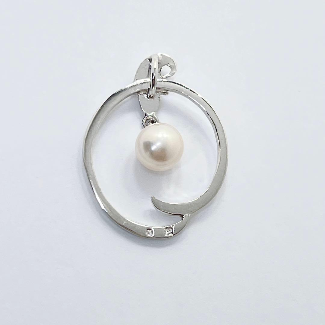 MIKIMOTO Akoya pearl necklace pendant top featuring 6.4mm white pearl set in silver