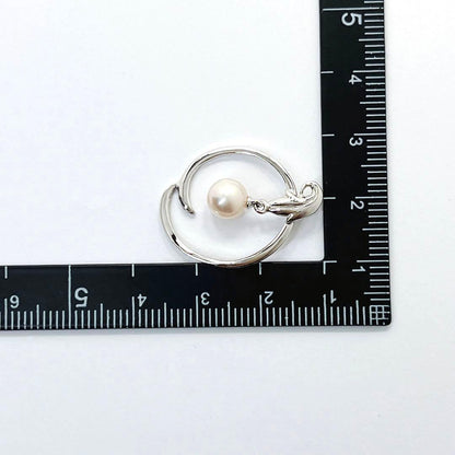 MIKIMOTO Akoya pearl necklace pendant top featuring 6.4mm white pearl set in silver