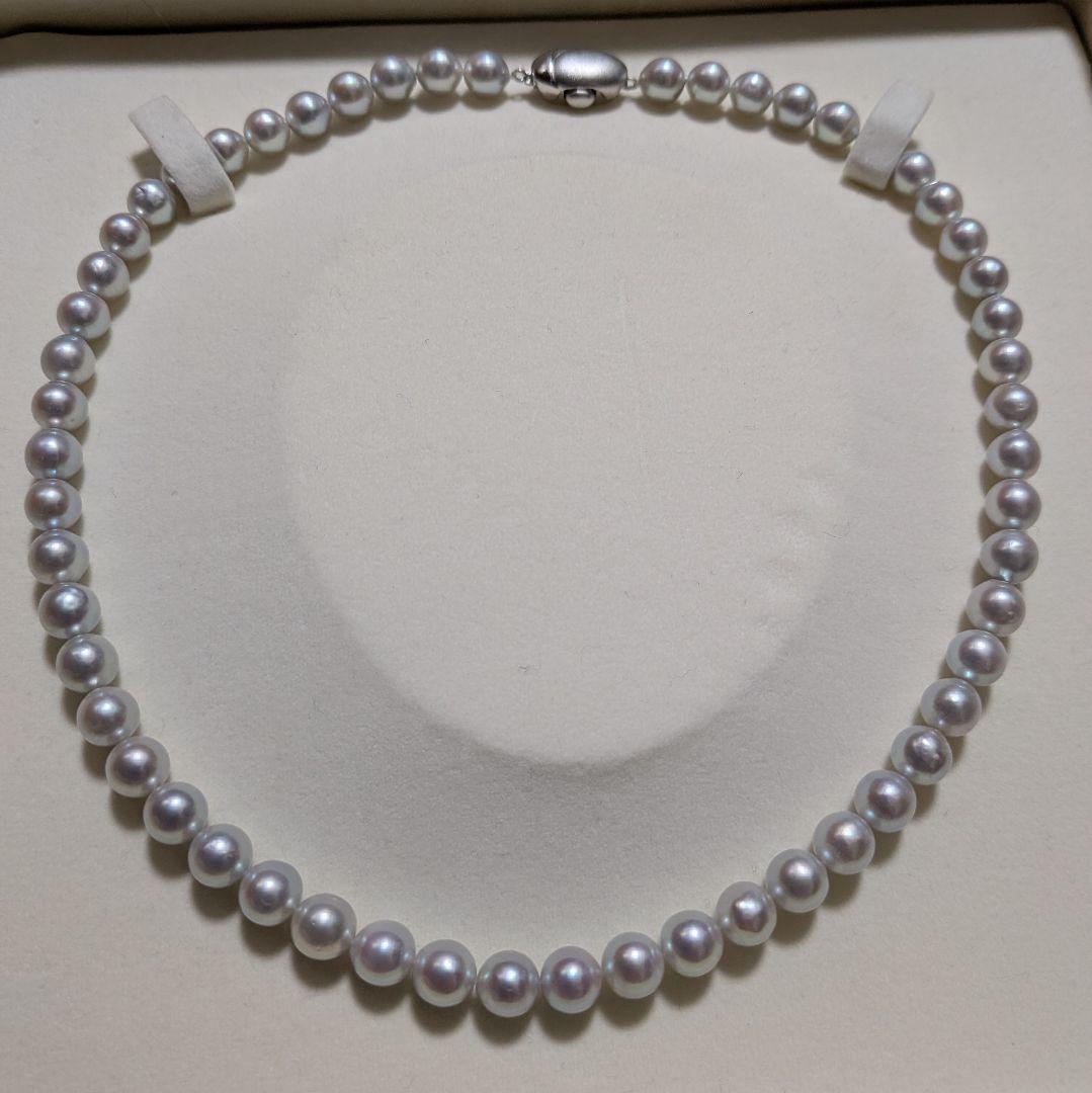 Takashi Pearl Necklace with 7.1-7.4mm pearls, 44cm length, and silver clasp on white background