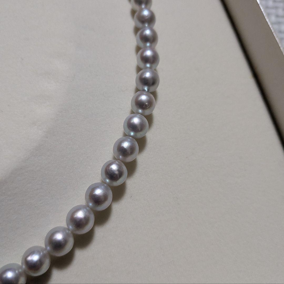 Takashi Pearl Necklace with 7.1-7.4mm pearls, 44cm length, and silver clasp on white background