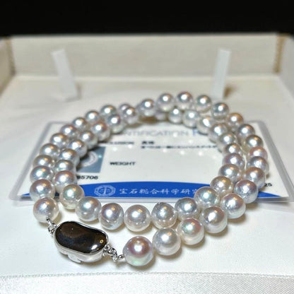 Natural Color Akoya Pearl Necklace M831 with 42cm length displayed on white background