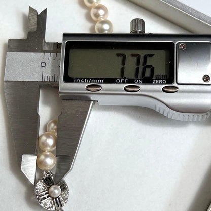 Teriyaki Akoya pearl necklace with 7.8mm pearls on a 41cm silver metal chain weighing 35 grams