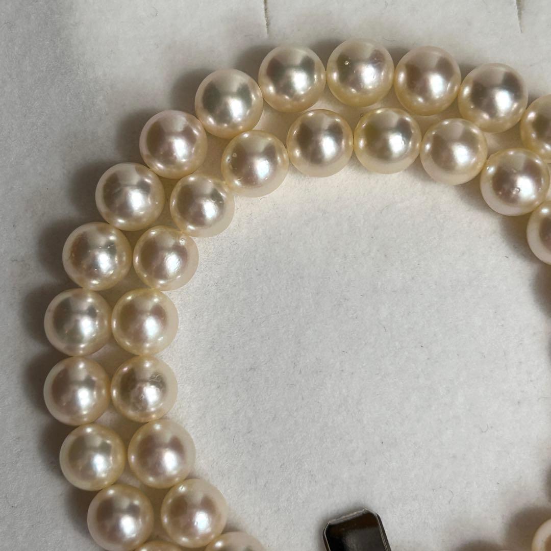 Teriyaki Akoya pearl necklace with 7.8mm pearls on a 41cm silver metal chain weighing 35 grams