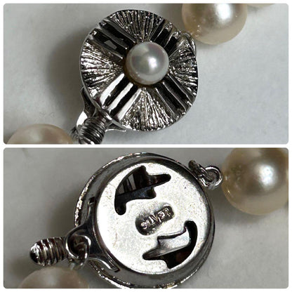Teriyaki Akoya pearl necklace with 7.8mm pearls on a 41cm silver metal chain weighing 35 grams