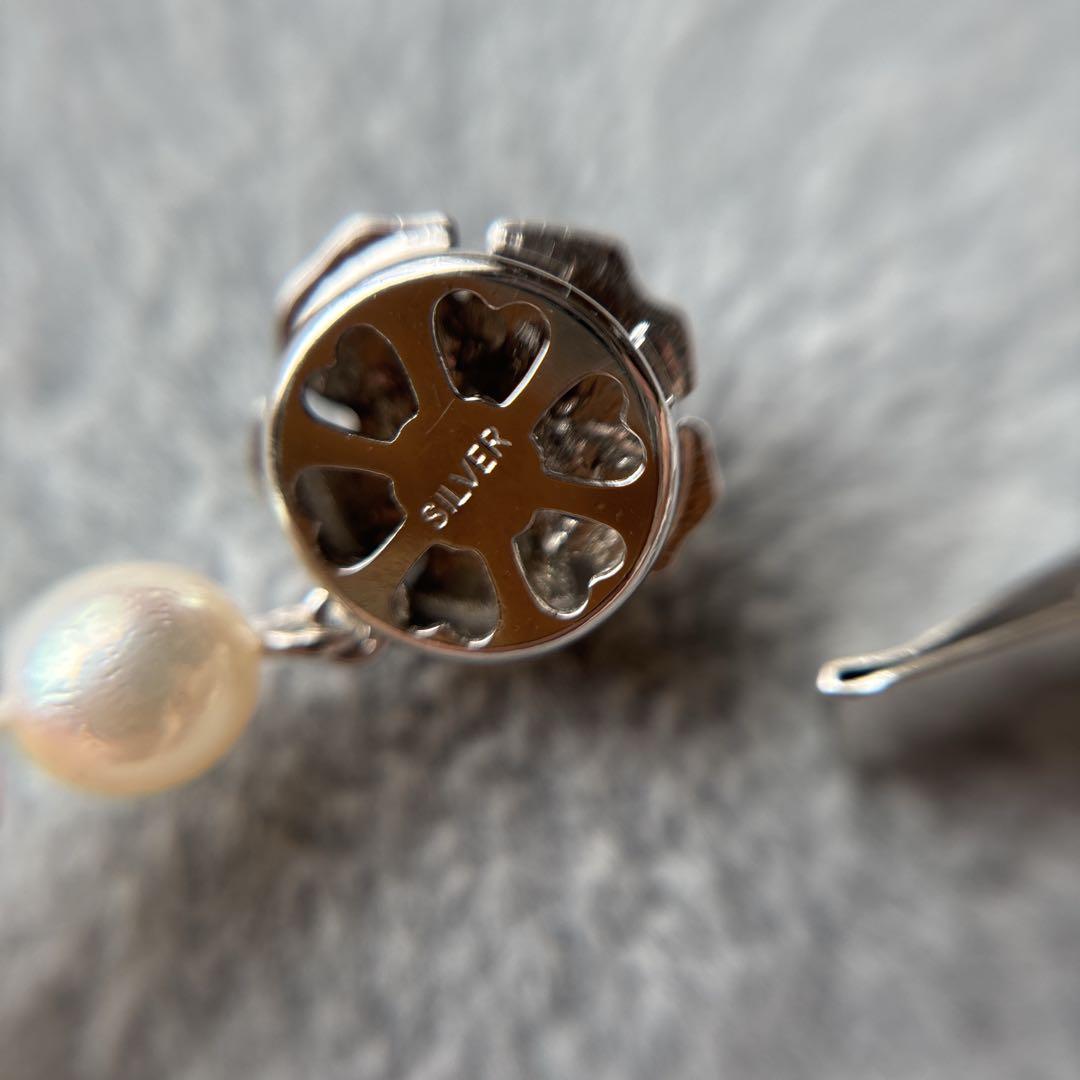 Akoya pearl necklace featuring 7mm white round beads on a 42cm silver-stamped string