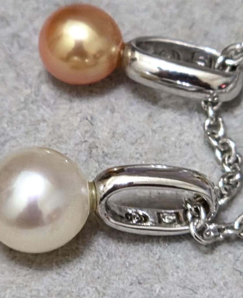 Tasaki Pearl necklace with three multi-color baby pearls on a silver chain about 42cm long