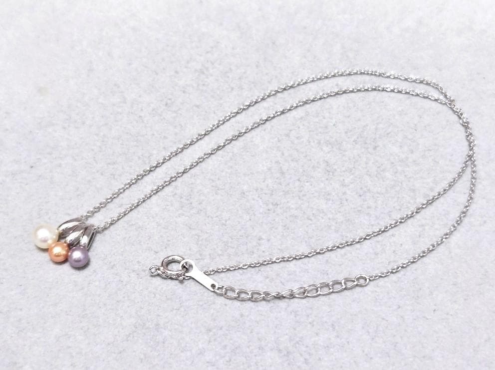 Tasaki Pearl necklace with three multi-color baby pearls on a silver chain about 42cm long