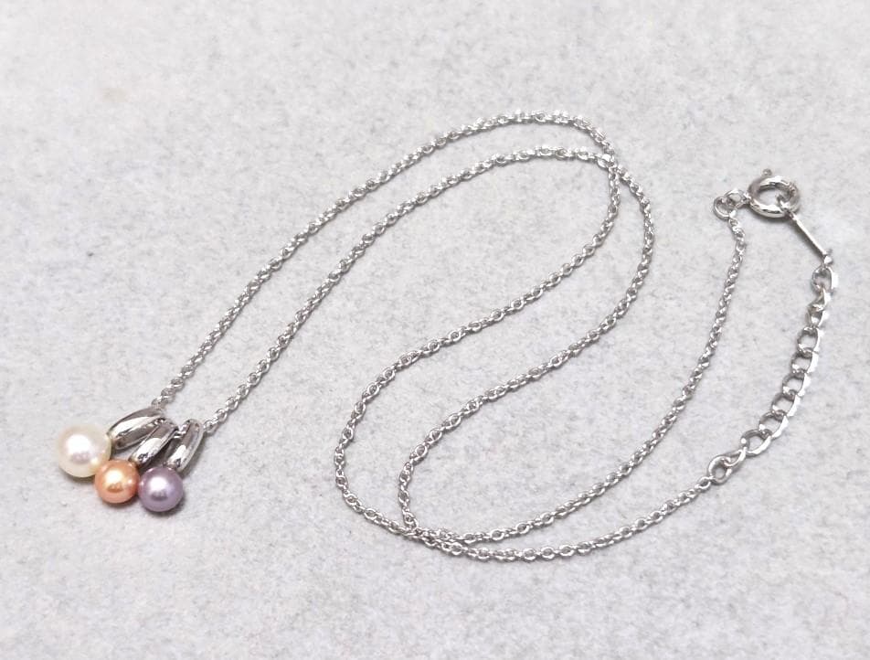 Tasaki Pearl necklace with three multi-color baby pearls on a silver chain about 42cm long