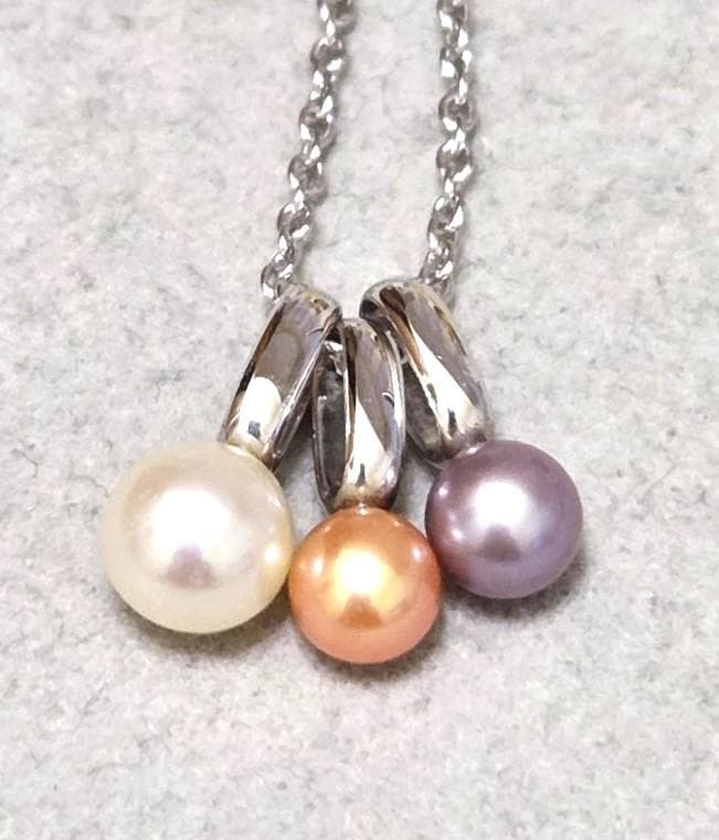 Tasaki Pearl necklace with three multi-color baby pearls on a silver chain about 42cm long