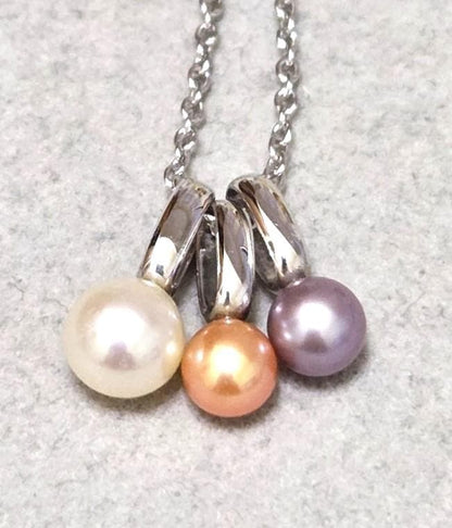 Tasaki Pearl necklace with three multi-color baby pearls on a silver chain about 42cm long