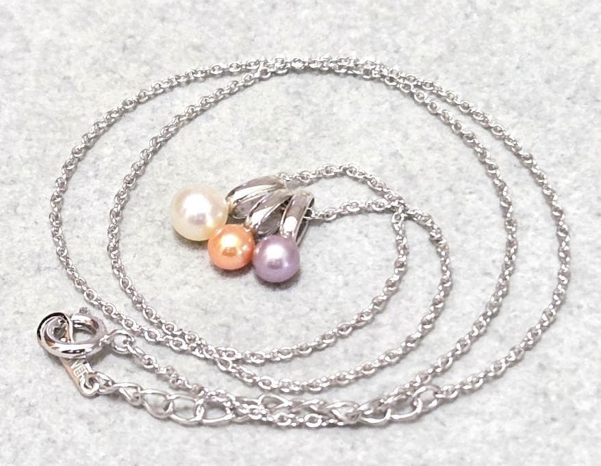 Tasaki Pearl necklace with three multi-color baby pearls on a silver chain about 42cm long
