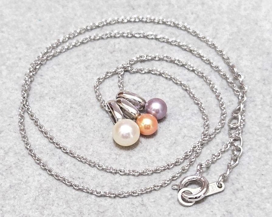 Tasaki Pearl necklace with three multi-color baby pearls on a silver chain about 42cm long