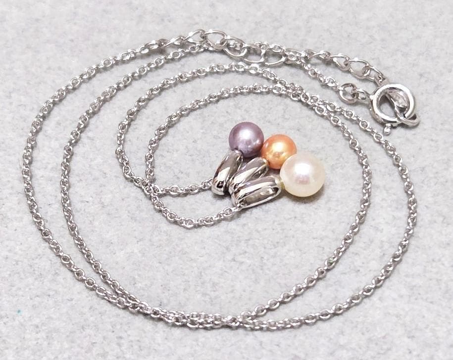 Tasaki Pearl necklace with three multi-color baby pearls on a silver chain about 42cm long