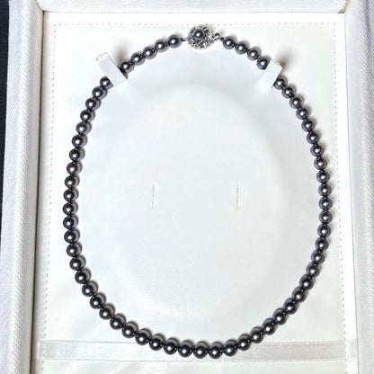 Akoya Pearl Necklace with 6.5-7.0mm round dark purple and dark gray pearls on a silver chain, 42.5cm long