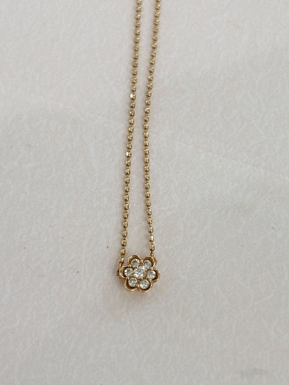 Agete flower motif necklace with 0.08ct diamond and adjustable 40.5 cm chain on white background