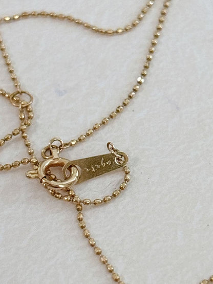 Agete flower motif necklace with 0.08ct diamond and adjustable 40.5 cm chain on white background