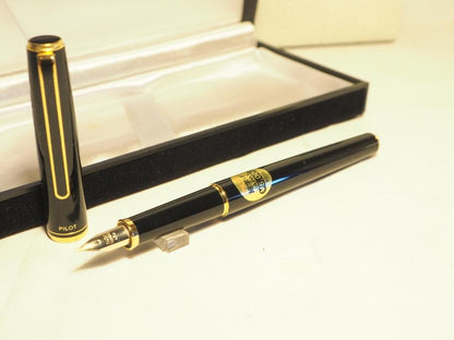 Pilot Fountain Pen Black Gold with 14K fine nib and included black case on white background