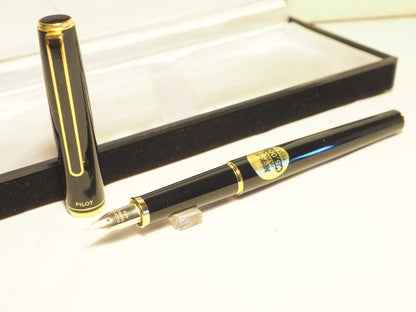 Pilot Fountain Pen Black Gold with 14K fine nib and included black case on white background