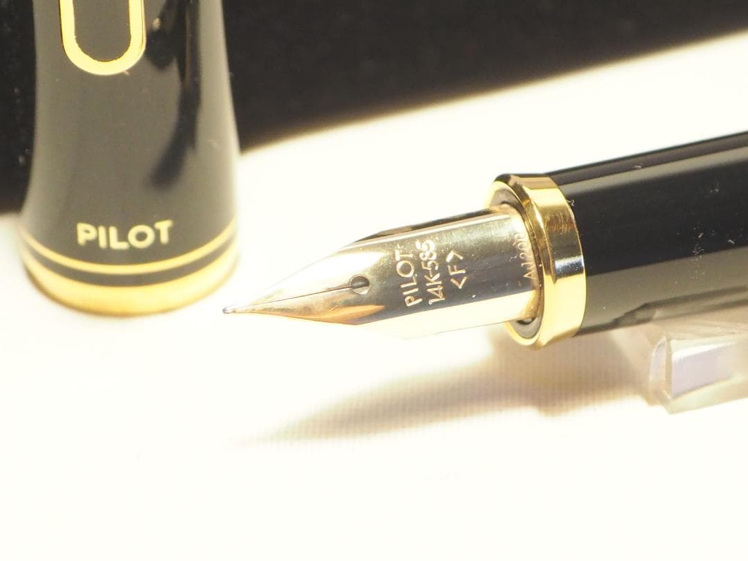 Pilot Fountain Pen Black Gold with 14K fine nib and included black case on white background