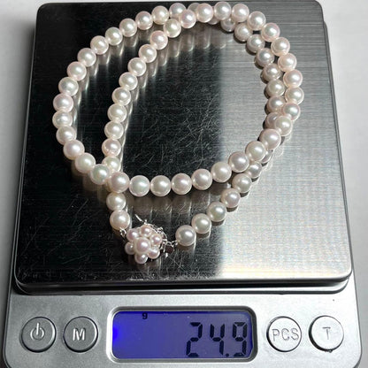 Tasaki Akoya pearl necklace with 6.0-6.5mm white round pearls, 42cm length, silver clasp, all knot style setting