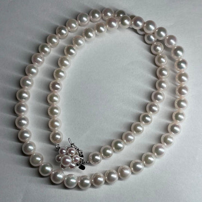 Tasaki Akoya pearl necklace with 6.0-6.5mm white round pearls, 42cm length, silver clasp, all knot style setting