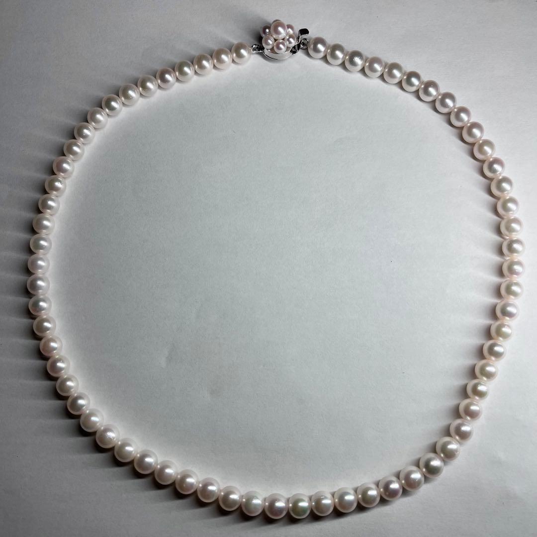 Tasaki Akoya pearl necklace with 6.0-6.5mm white round pearls, 42cm length, silver clasp, all knot style setting